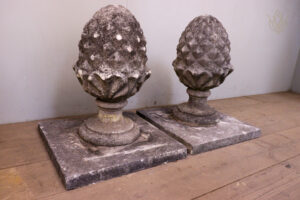 Pair of Composition Stone Acorns on Bases - WM12192